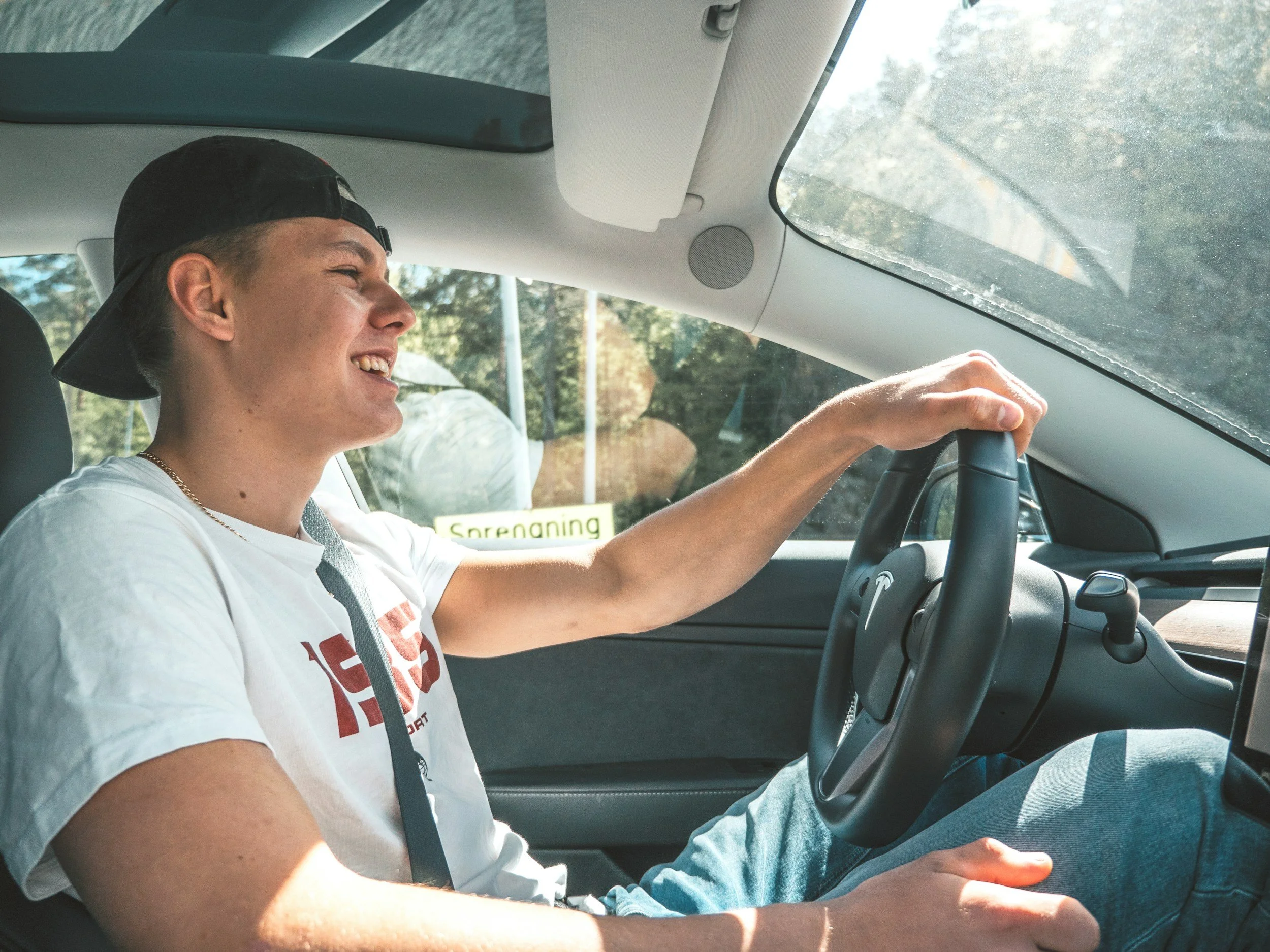 Driver at the wheel of a car in New Zealand