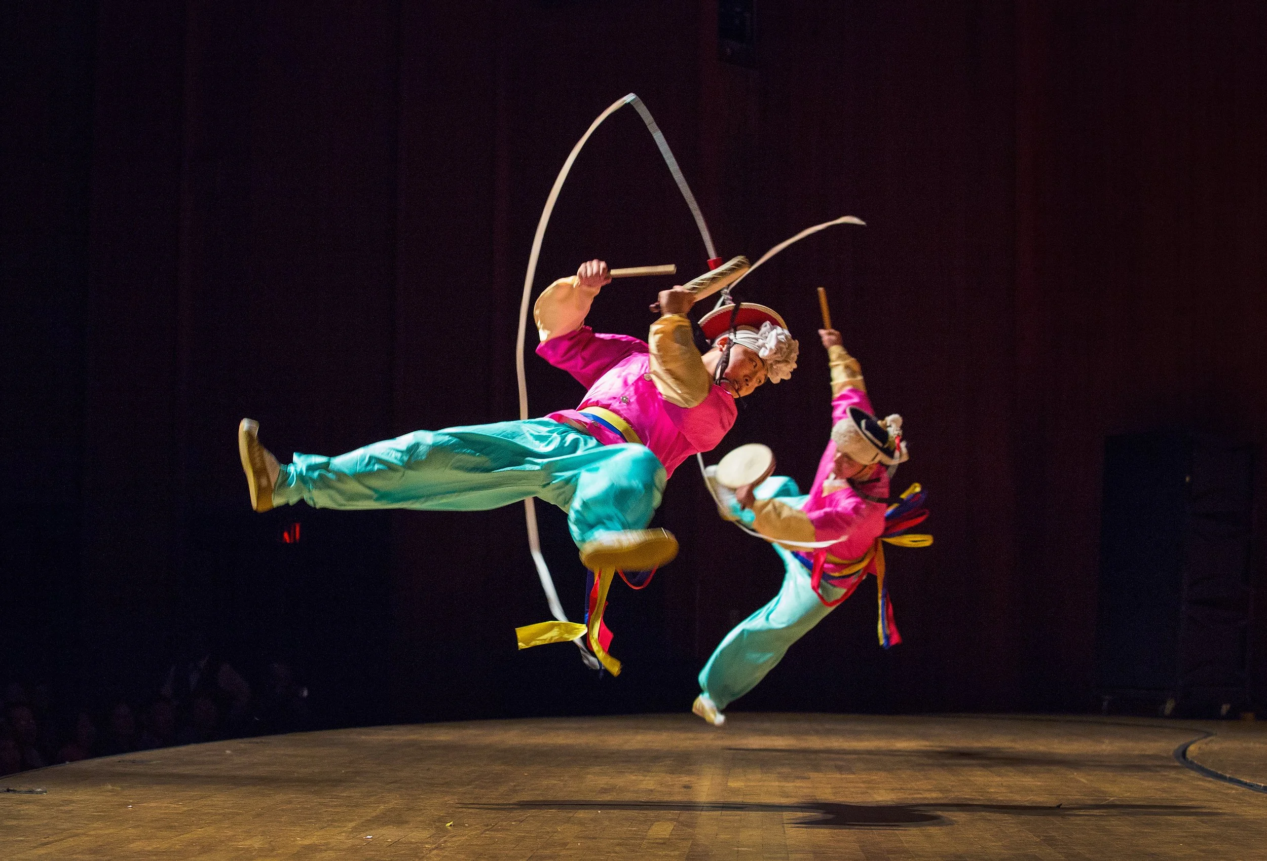 Republic of Korea Army Band members perform the traditional Korean farmers’ dance nongak, showcasing the “jaban-dwijipgi” (headpiece flip) during a sangmo ribbon-spinning routine.