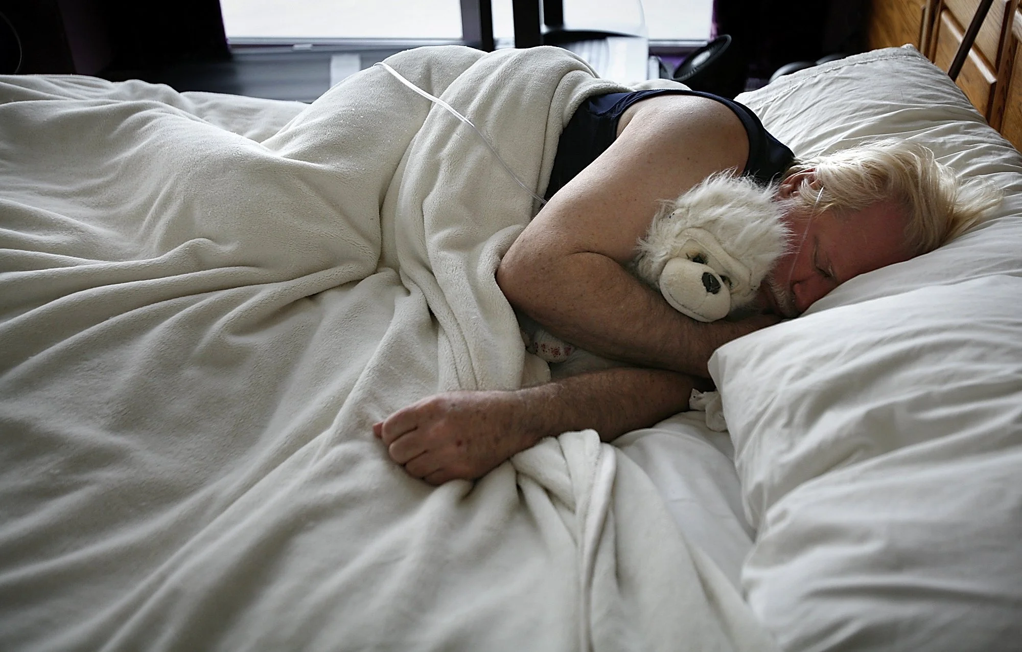 ‘There were many nights when I didn’t know if I was dead or alive… but when I could feel Monkey next to me, I knew I was still here,’ says Wes Harvey of the stuffed animal his wife gave him when he was diagnosed with terminal cancer six years ago. To