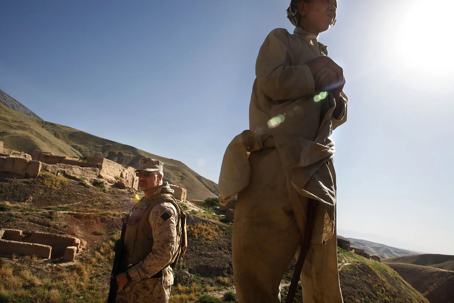 Life in remote villages like Ghandak continues much as it has for generations. Tucked in northern Afghanistan, this settlement of herders and wheat farmers has no electricity, no running water, no school — not even official records. When asked his ag