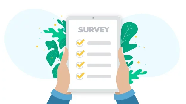 Person holding a tablet with a survey on the screen, surrounded by green leaves.