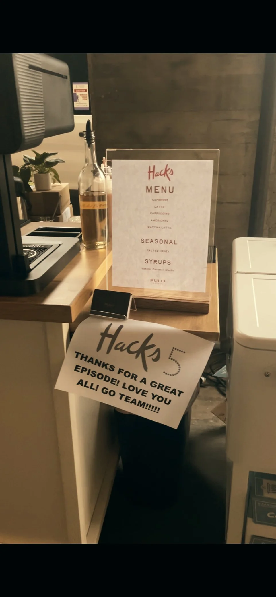 On-set coffee catering setup for TV production with mobile espresso bar and custom menu signage in Los Angeles