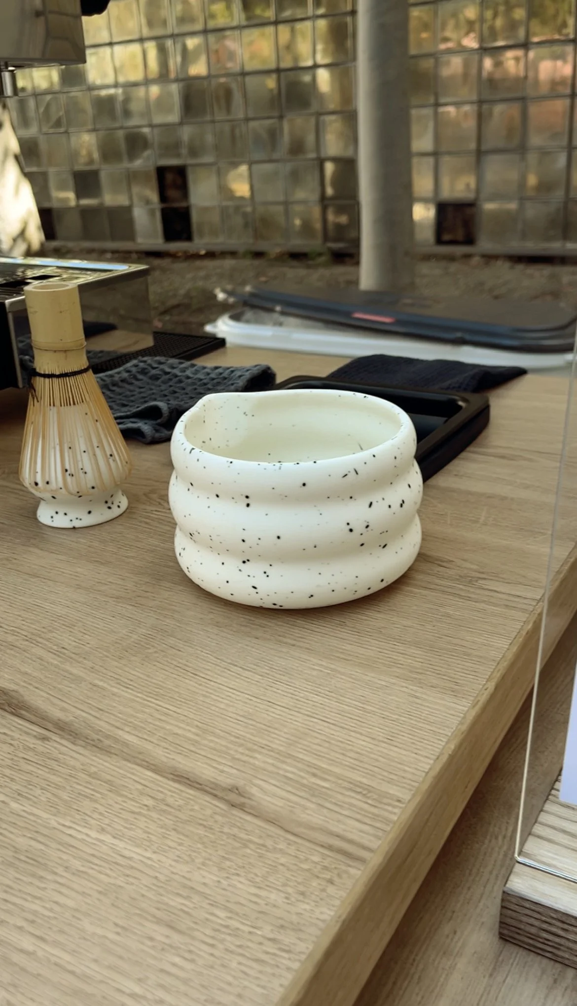 Ceremonial matcha chawan and bamboo chasen whisk on a Pulo Coffee mobile matcha bar setup at an event in Los Angeles
