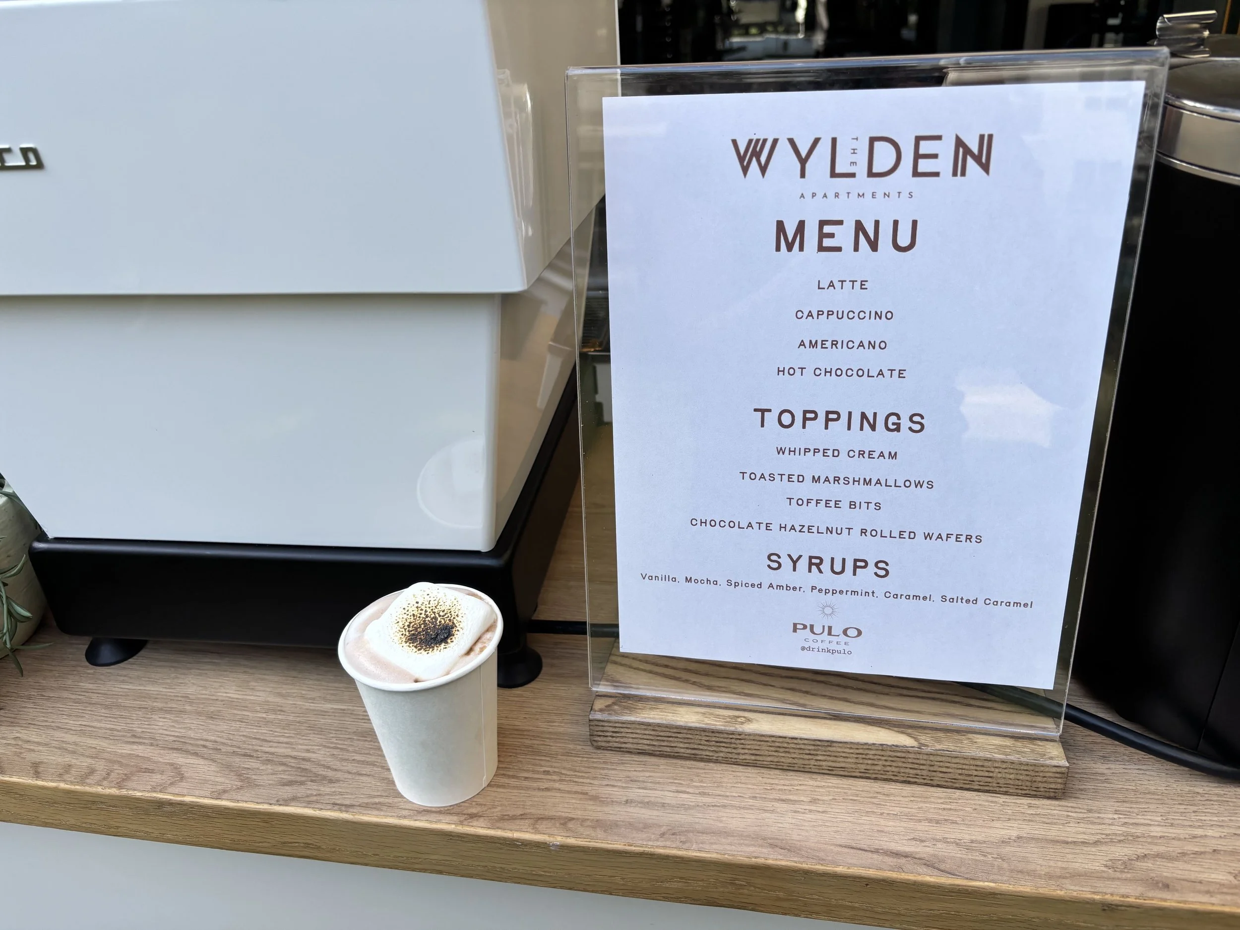 Custom branded hot chocolate and coffee menu for The Wylden Apartments resident event by Pulo Coffee
