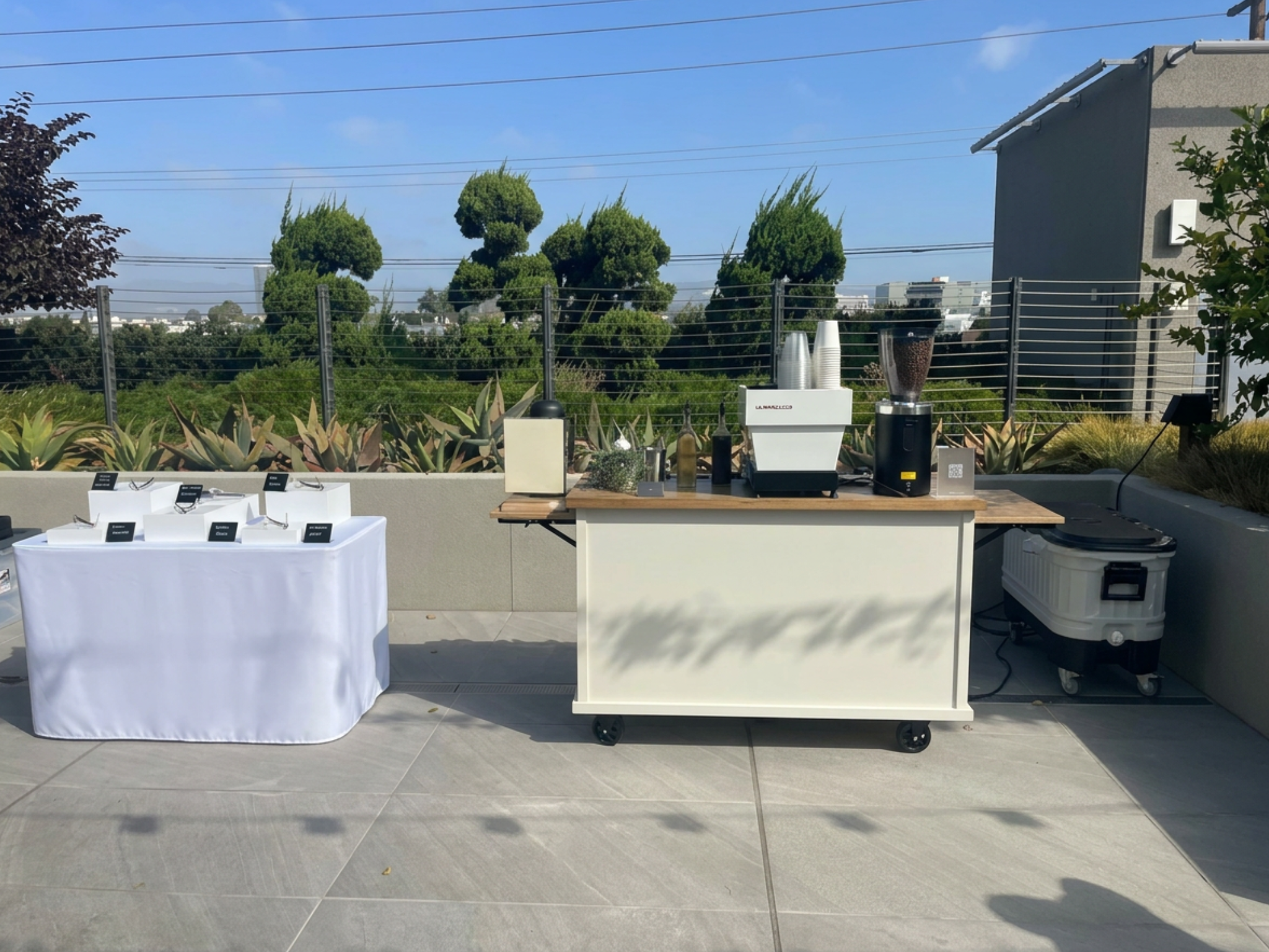 Pulo Coffee espresso cart and pastry table with risers at Stanley x Kacey Musgraves collection launch rooftop event at PMC in Los Angeles