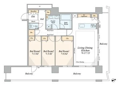 リビングダイニングキッチンと三つの寝室、バルコニーが配置された間取り図。