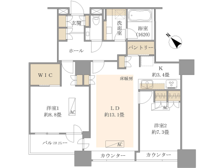 3LDKの間取り図で、玄関、ホール、浴室、洗面台、トイレ、玄関収納、リビングダイニングキッチン、洋室1と洋室2、バルコニー、ウォークインクローゼットなどが示されている。