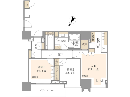 日本語：間取り図の住宅平面図で、トイレ、玄関、洗面室、浴室、納戸、キッチン、リビングダイニング、洋室が含まれています。
