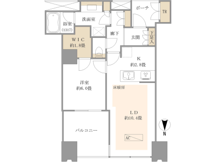 この画像は、1LDKの間取り図です。玄関、ポーチ、トイレ、浴室、洗面室、ウォークインクローゼット（WIC）、洋室（約6.0畳）、キッチン（約2.8畳）、リビング・ダイニング（約10.4畳）、バルコニー、エアコンなどの設備が示されています。