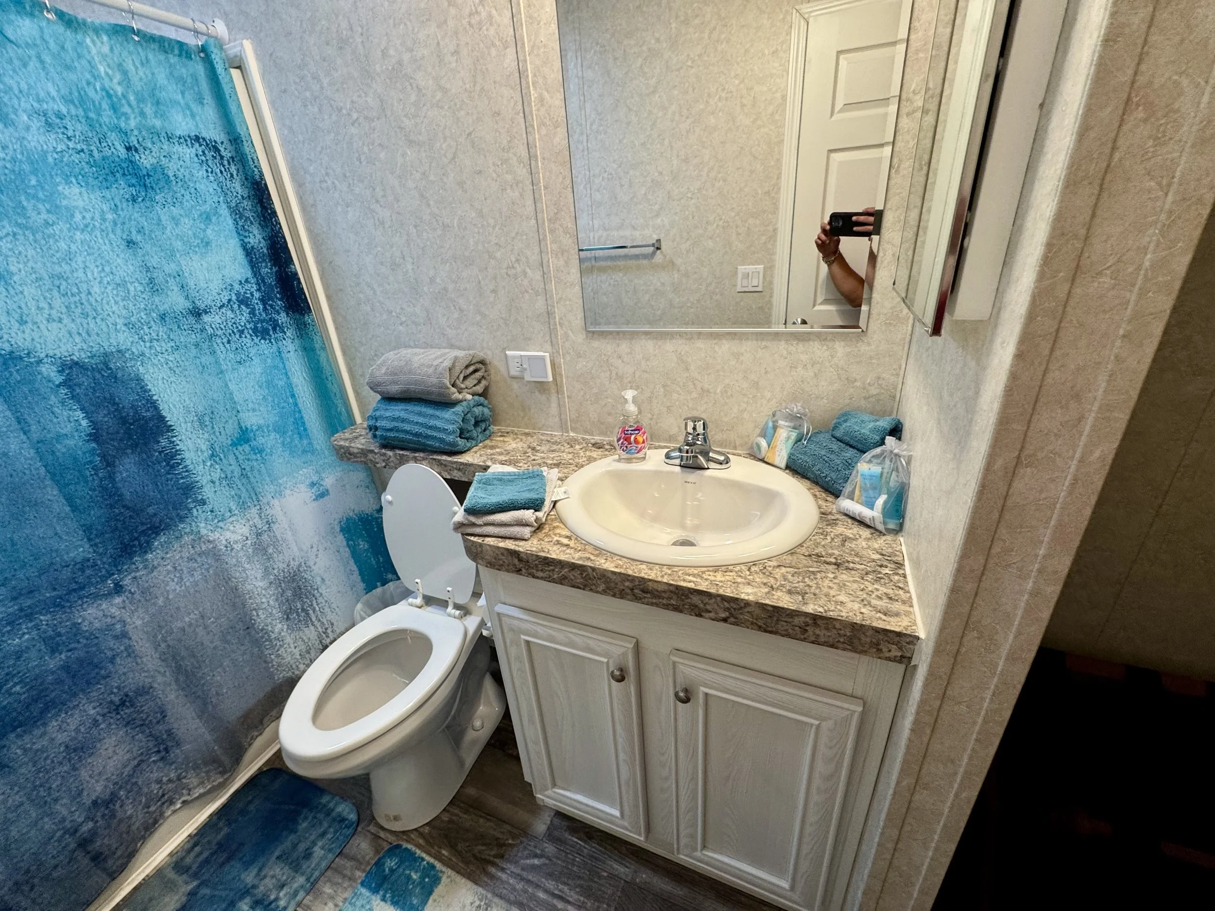 Bath 2-
Shower/Tub , plenty of towels, Bergman Kelly hygiene products, Hairdryer.  Area provides space to hang your clothes and a luggage rack.