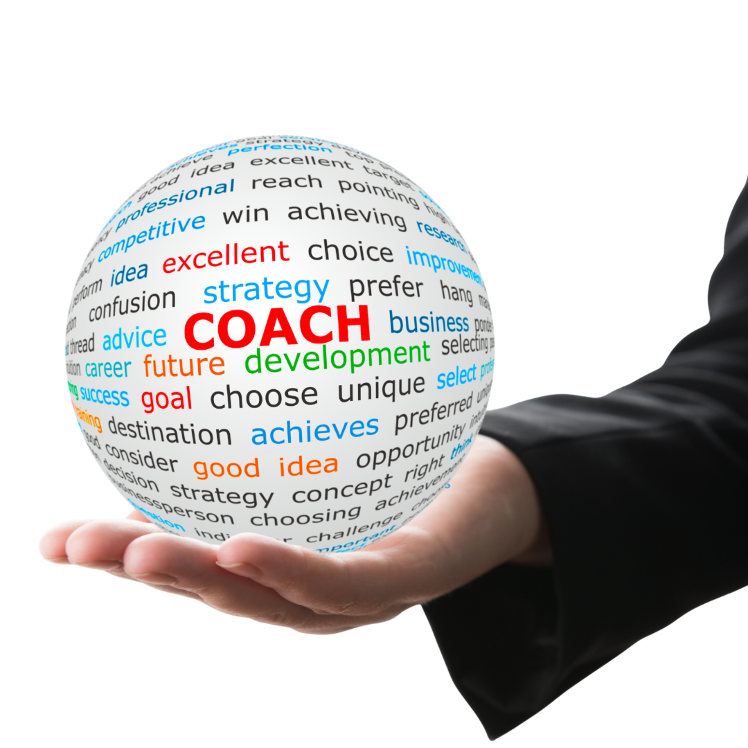 A hand holding a white sphere with business-related words in various colors and sizes, including the prominent word 'COACH' in red, signifying coaching, strategy, development, and success.