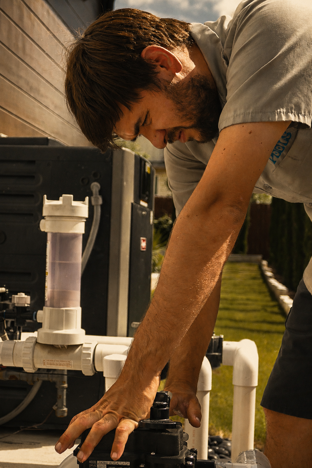 Avid Pools Technician Working On Pool Pumps