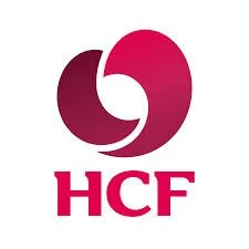 A logo with two stylized overlapping hearts in shades of pink and maroon, with the letters "HCF" below.