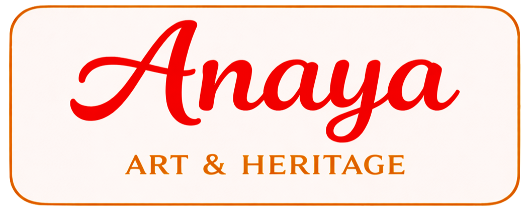 A rectangular logo with a white background, orange border, and rounded corners that reads "Anaya Art & Heritage" in red cursive and orange serif fonts.