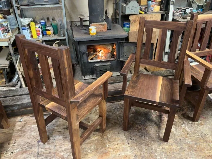 Custom Black Walnut Chairs warming up by the fire for final finish day 🥰🔥🪑
.
.
.
#wood #woodworker #woodworkersofinstagram #smallbusiness #furniture #furnituremaker #diningtable #blackwalnut #walnuttable #rusticfarmhouse #rusticdecor #interiordesi