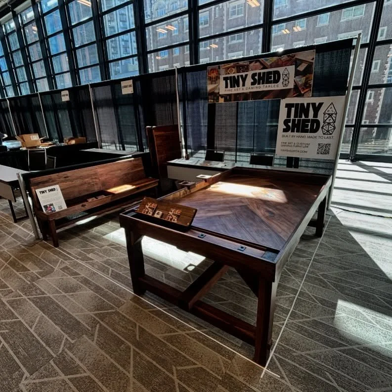 All set up at Pax West 2024! Come visit us weekend at booth #4400 and see a gorgeous custom walnut gaming table and bench 🤓

@officialpax_ 

.
.
.
.
#wood #woodworker #woodworkersofinstagram #smallbusiness #furniture #furnituremaker ###blackwalnut #