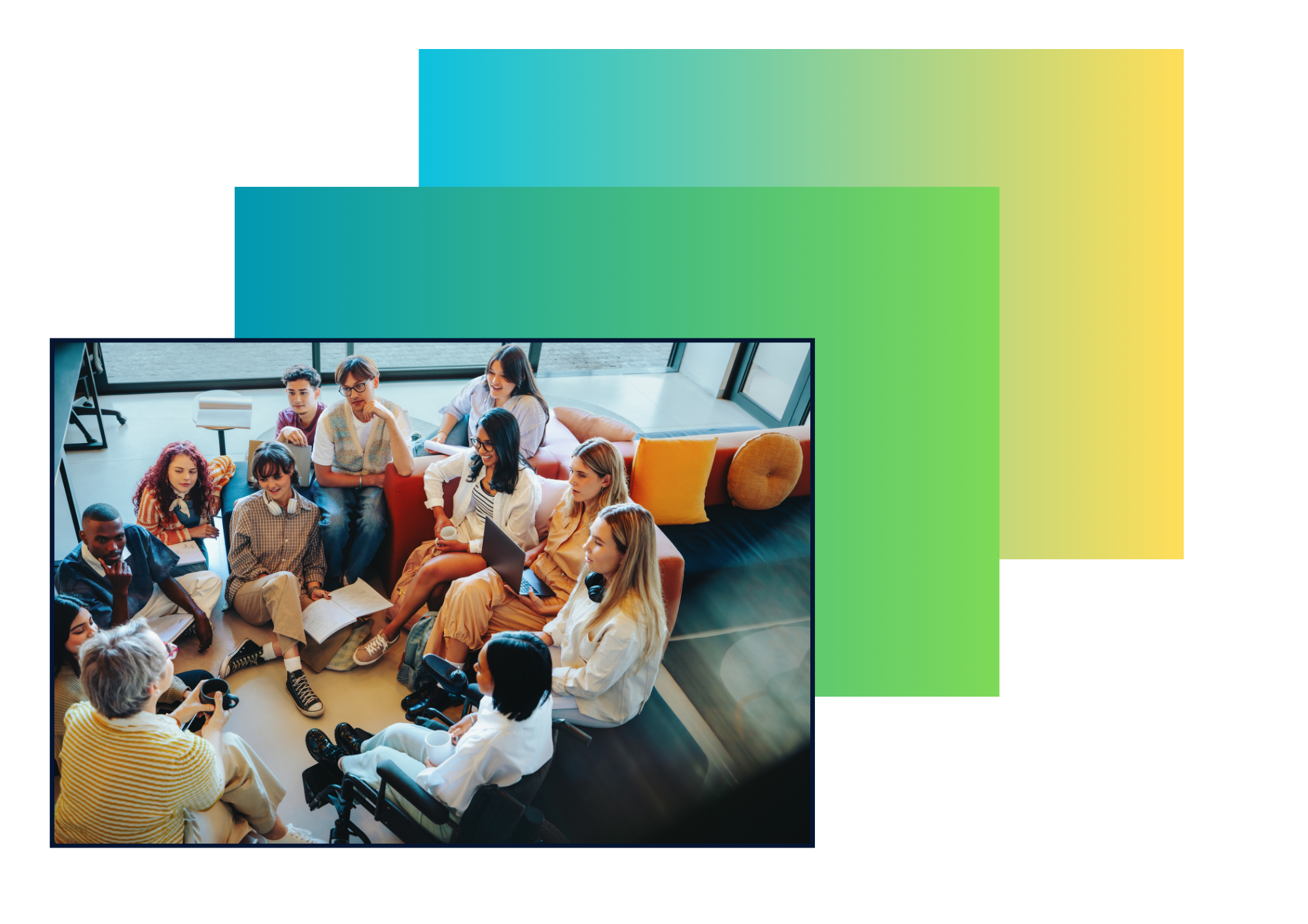 Group of diverse young adults seated on the floor in a modern indoor space, engaging in conversation and using laptops.