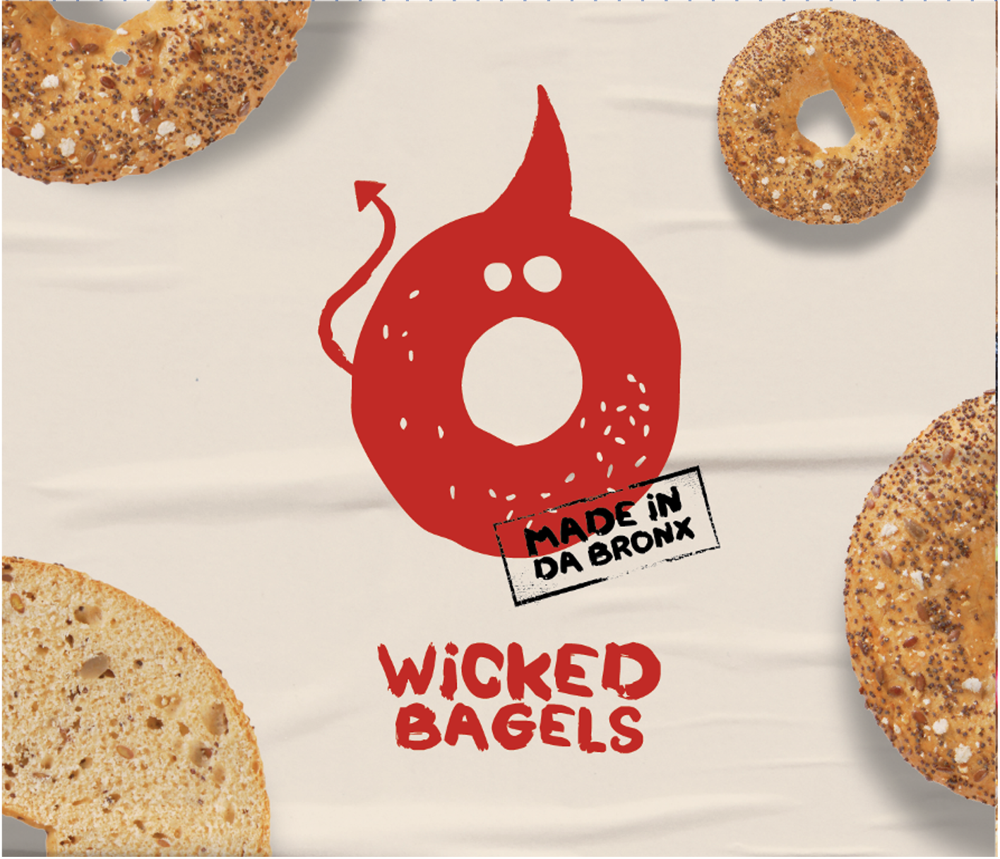 Wicked Bagels packaging with a cartoon bobcat head and the text "Made in DA Bronx" and "Wicked Bagels", surrounded by various bagels with toppings.
