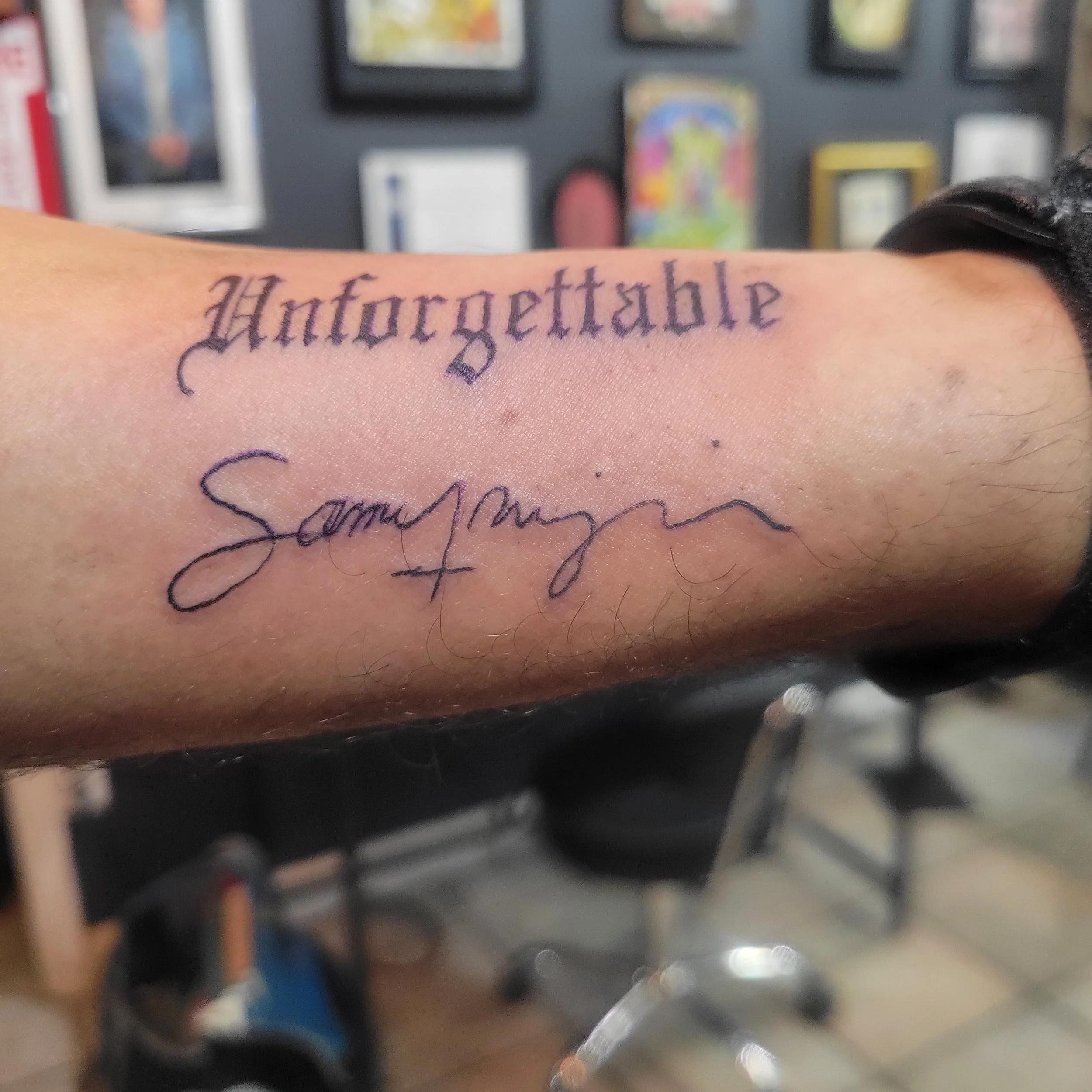 Tattoo on a person's forearm with the words 'Untargetable' in gothic font and 'Samjucra' written in cursive.