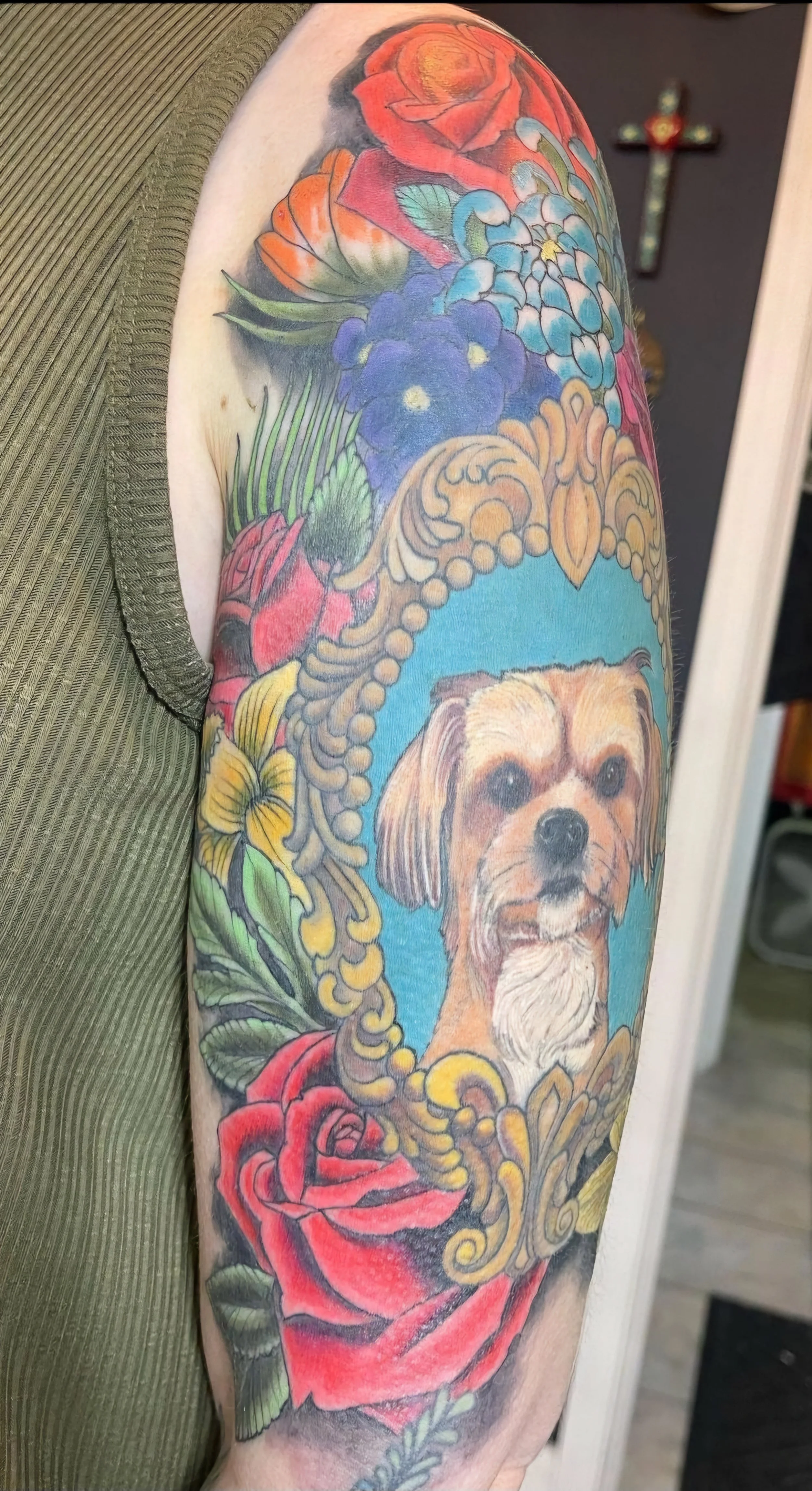 Bright flowers added to this dog portrait (previous artist) arm sleeve.
