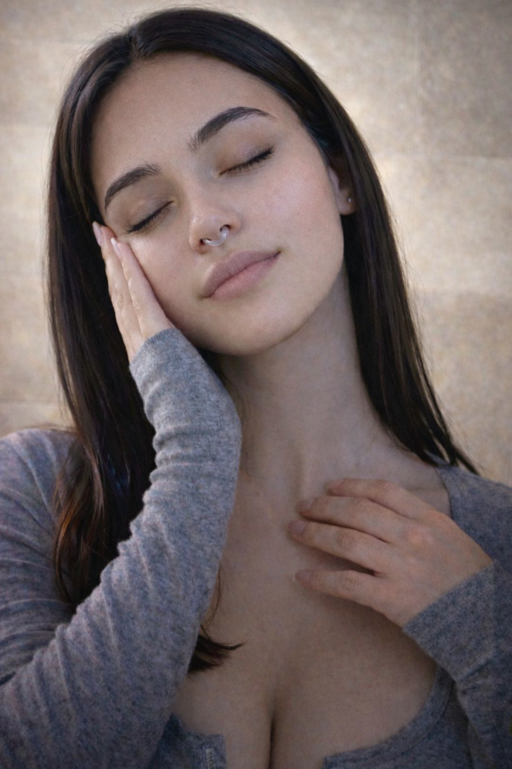 Woman breathing in AURALIS aromatherapy scent using nasal diffuser ring