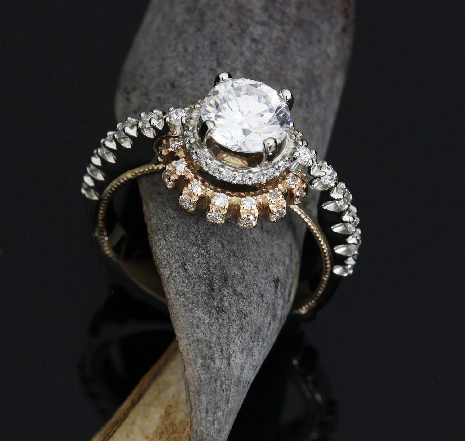 Two-tone round diamond engagement ring with rose gold halo by Kaz Jewelry