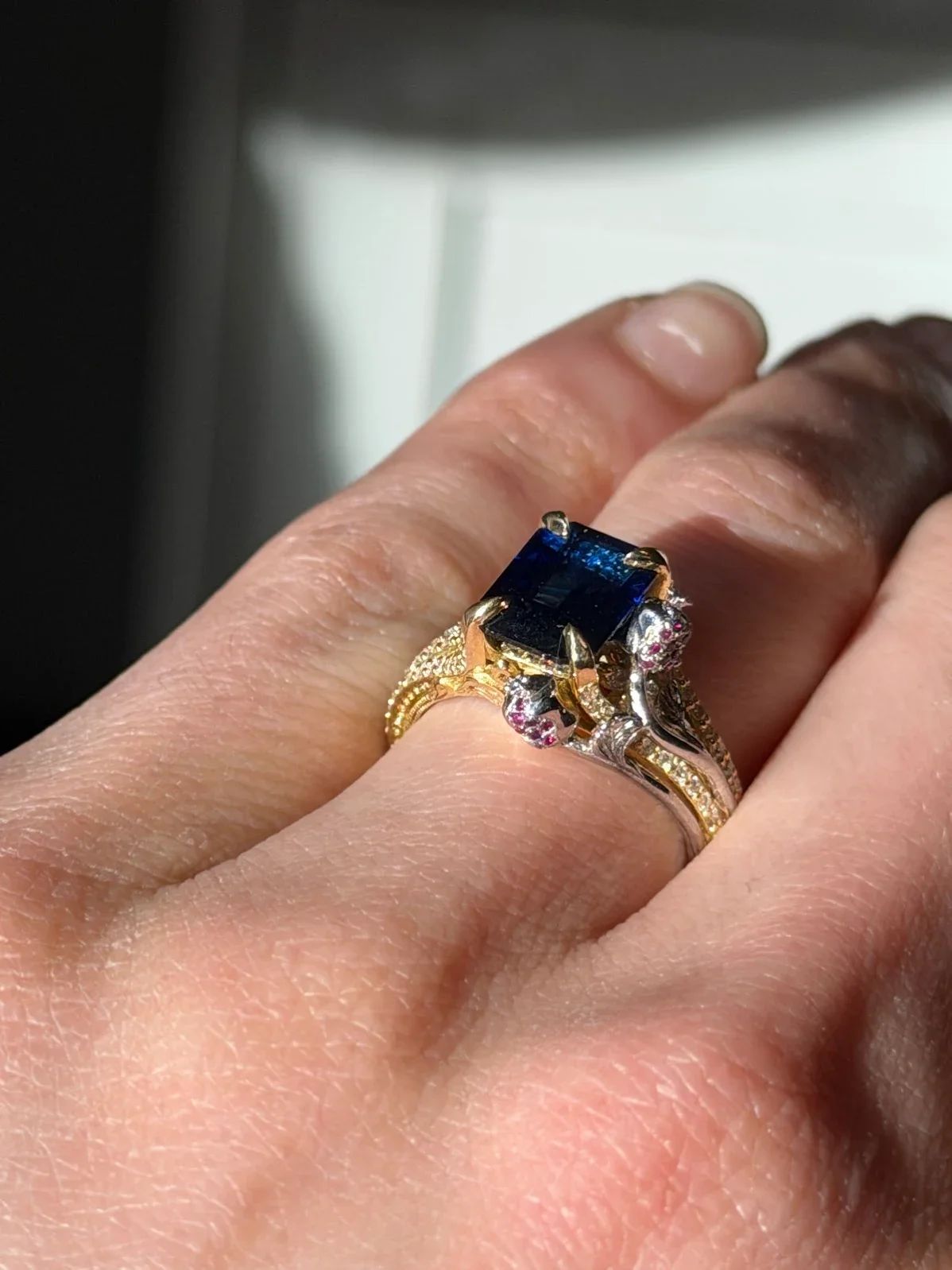 Custom sapphire engagement ring with Armenian-inspired details handcrafted by Kaz Jewelry in Laguna Niguel.