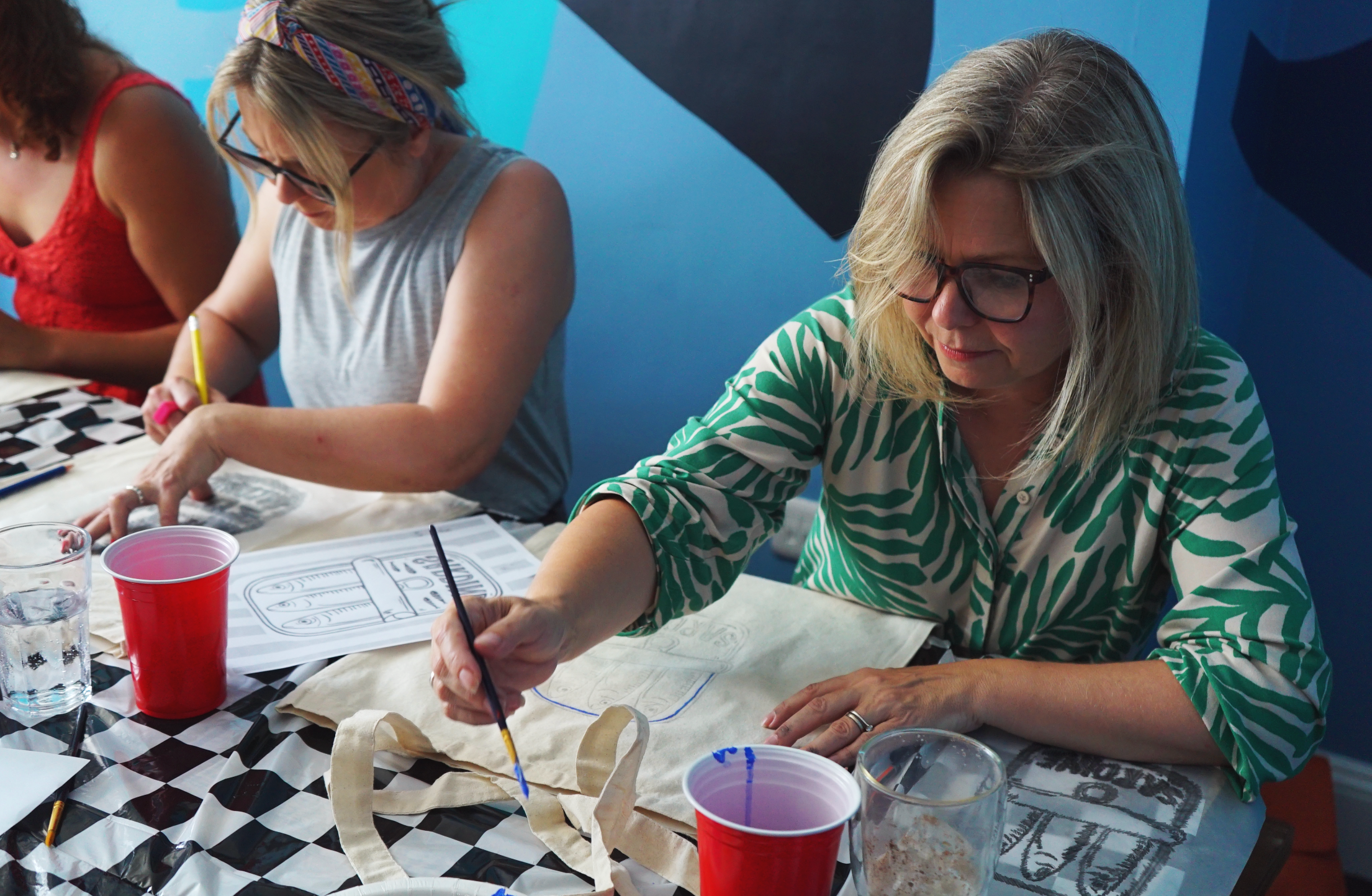 What happens at a Tote Bag Painting Workshop? 