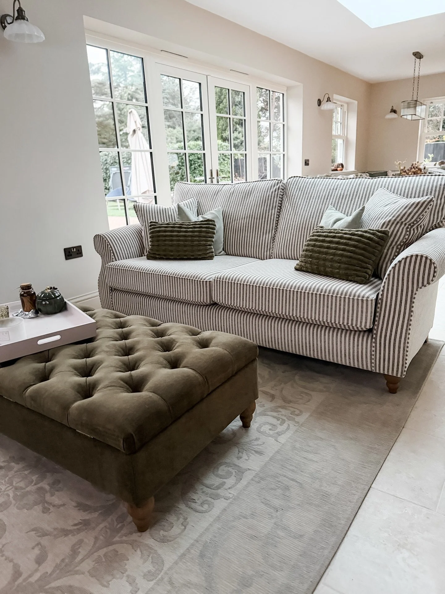 The snug has a new addition 🤍

Our new sofa arrived yesterday and I&rsquo;m completely in love. I&rsquo;ve always wanted a striped sofa and this one is just perfect.  Oat and green, soft, and so comfortable (especially if you&rsquo;ve got longer leg