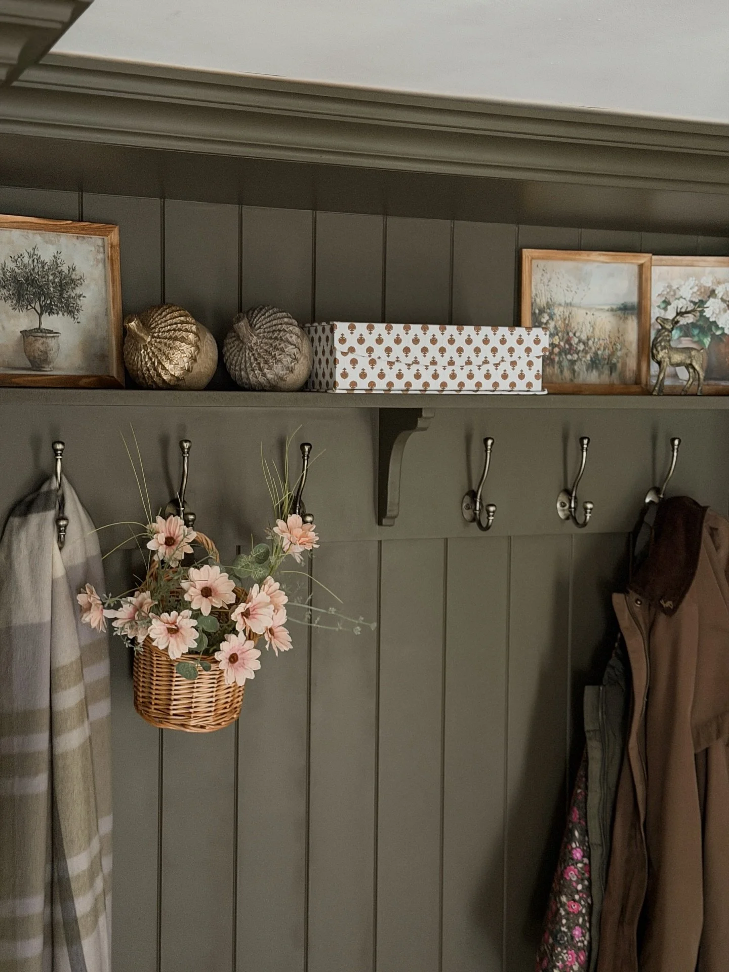 February shelf styling in the boot room.

Because it&rsquo;s raining for day 145,678 of 2026 and I can&rsquo;t get in the garden, I decided the shelf needed to earn its keep and look pretty &mdash; purely to cheer me up.

I love the deep green-brown 