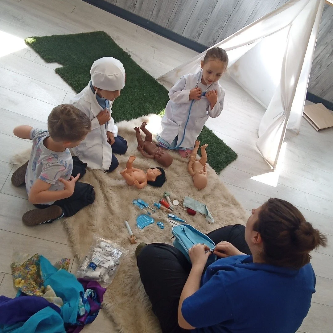 This week at Treehouse Club: We celebrated National Nurses Day at Quilters! Our little ones enjoyed playing doctors and nurses, caring for their 'patients.' They used medical tools, bandaged up 'injuries,' and gave 'shots' to keep the babies healthy.