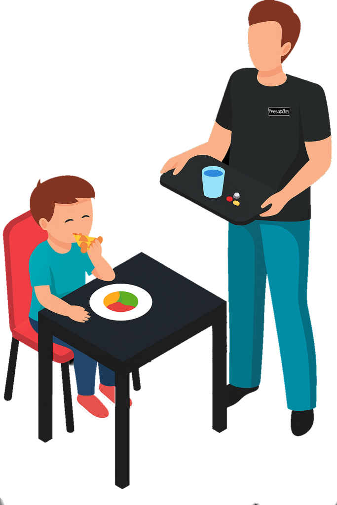 A young boy sitting at a table with a plate of food, smiling and eating pizza, while a woman standing nearby serves pills and a glass of water on a tray.