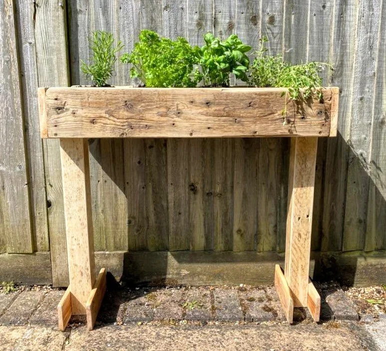 Off the ground herb planter, to limit the amount of bending down. 