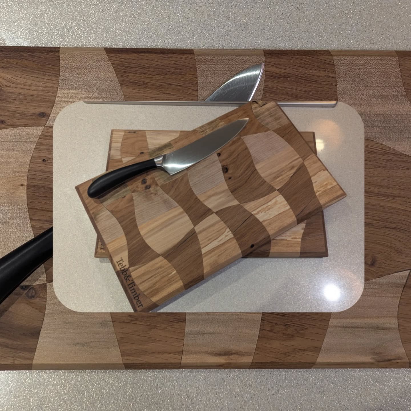 Jan 26 insight to what we've been doing! 

1.Wavy checkered chopping board - experiment I want to do for ages!
2.HMS Victory oak and epoxy side Table 
3&amp;4.Trophies mock up for Dog Agility Competitions later this year 
5.The face I made when I rea