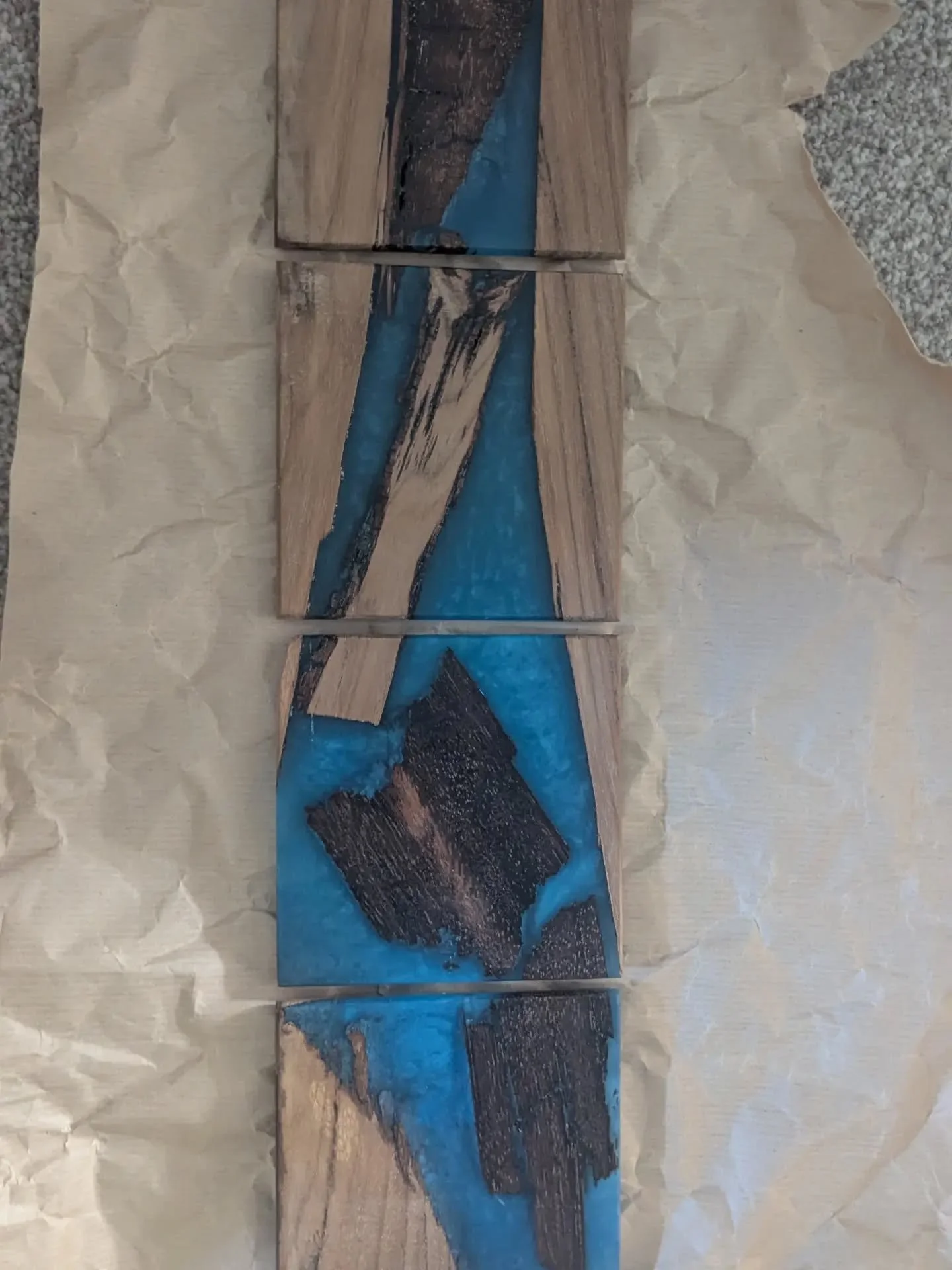 July 2026.
Hard mental health month, lots happening around me. Yet still managing to keep creating and pushing myself to new ventures! 
1. Epoxy and Oak coaster set
2. Victory oak book marks on the way to the Historic Dockyards
3&amp;4. Trophey desig