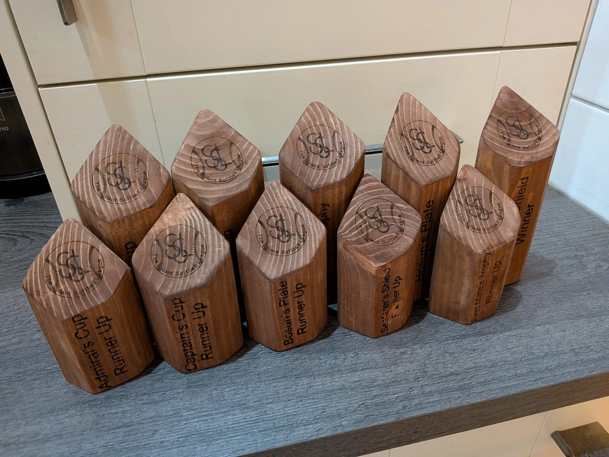 A charity tournament reached out for some handmade wooden trophies. Each final and the leagues logo engraved on. 