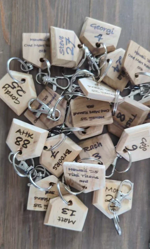 To celebrate softballs teams success, these personalised keyrings were commissioned for each player.