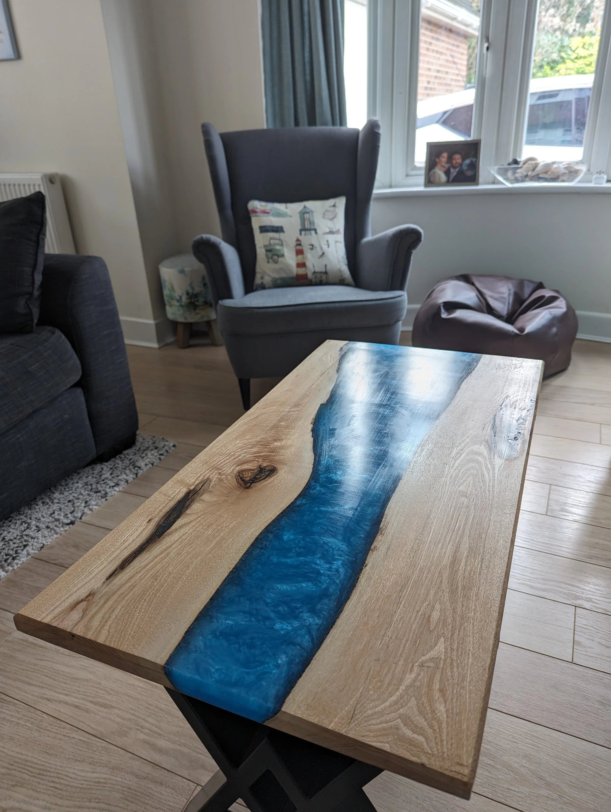 New home owners wanting a river coffee table. Colour chosen to represent their work ties. (spoiler involves the sea)
