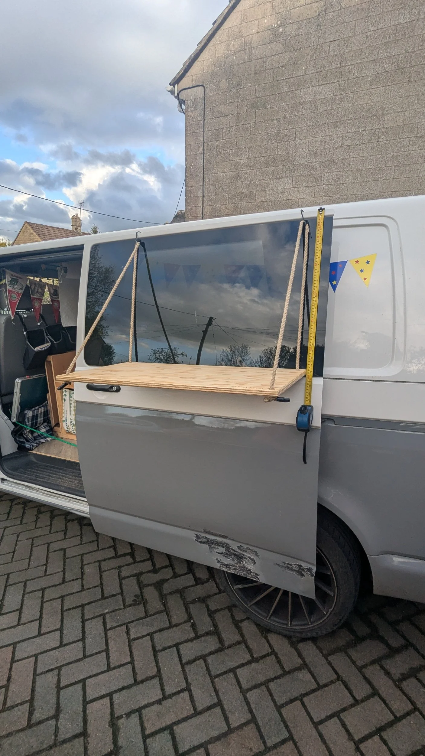 Hanging shelf for a camper van conversion. Perfect addition to the spring and summer month spent cooking outdoors. 