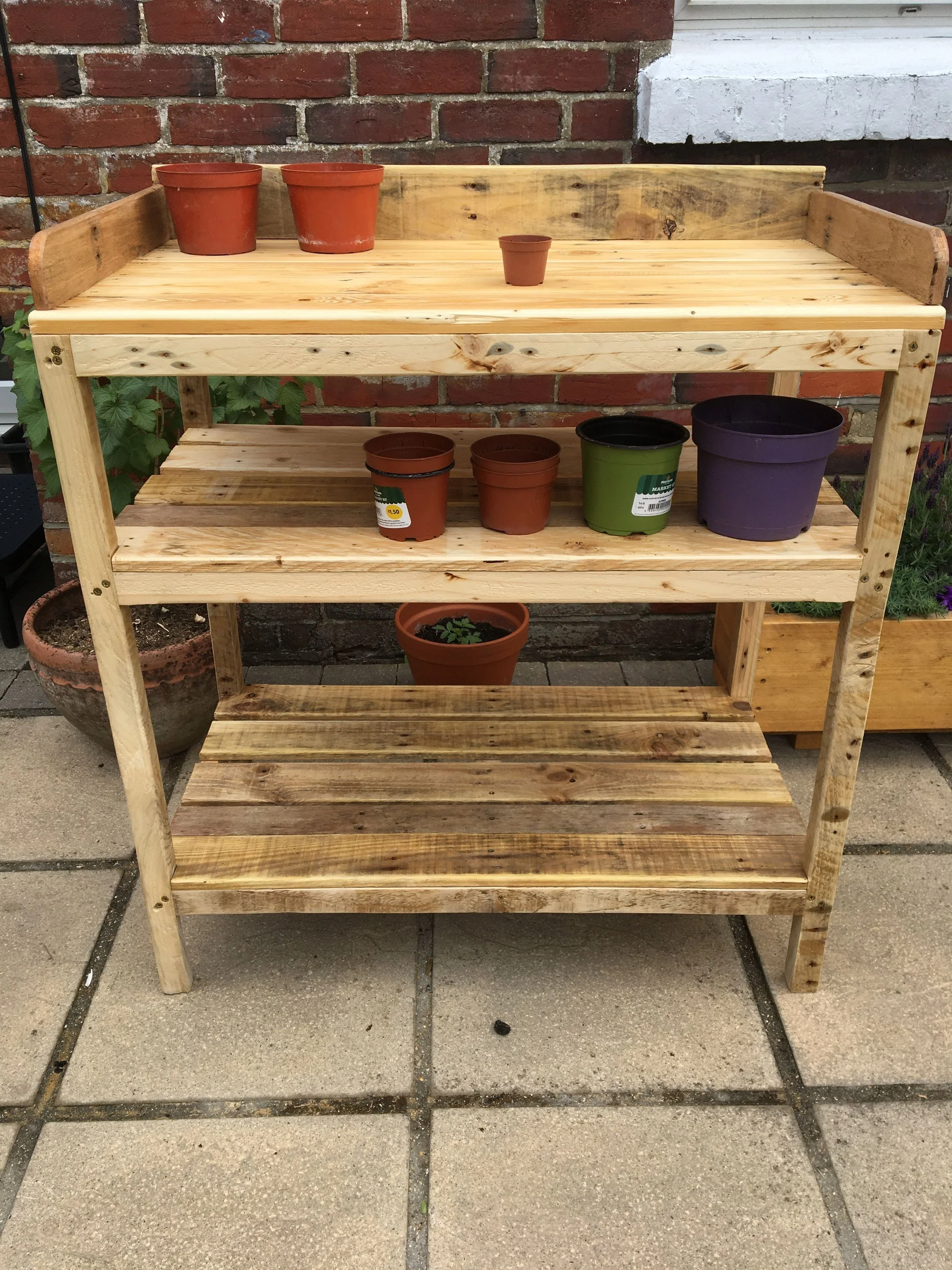 Potting table for a client to provide more shelves and fit in her greenhouse. 