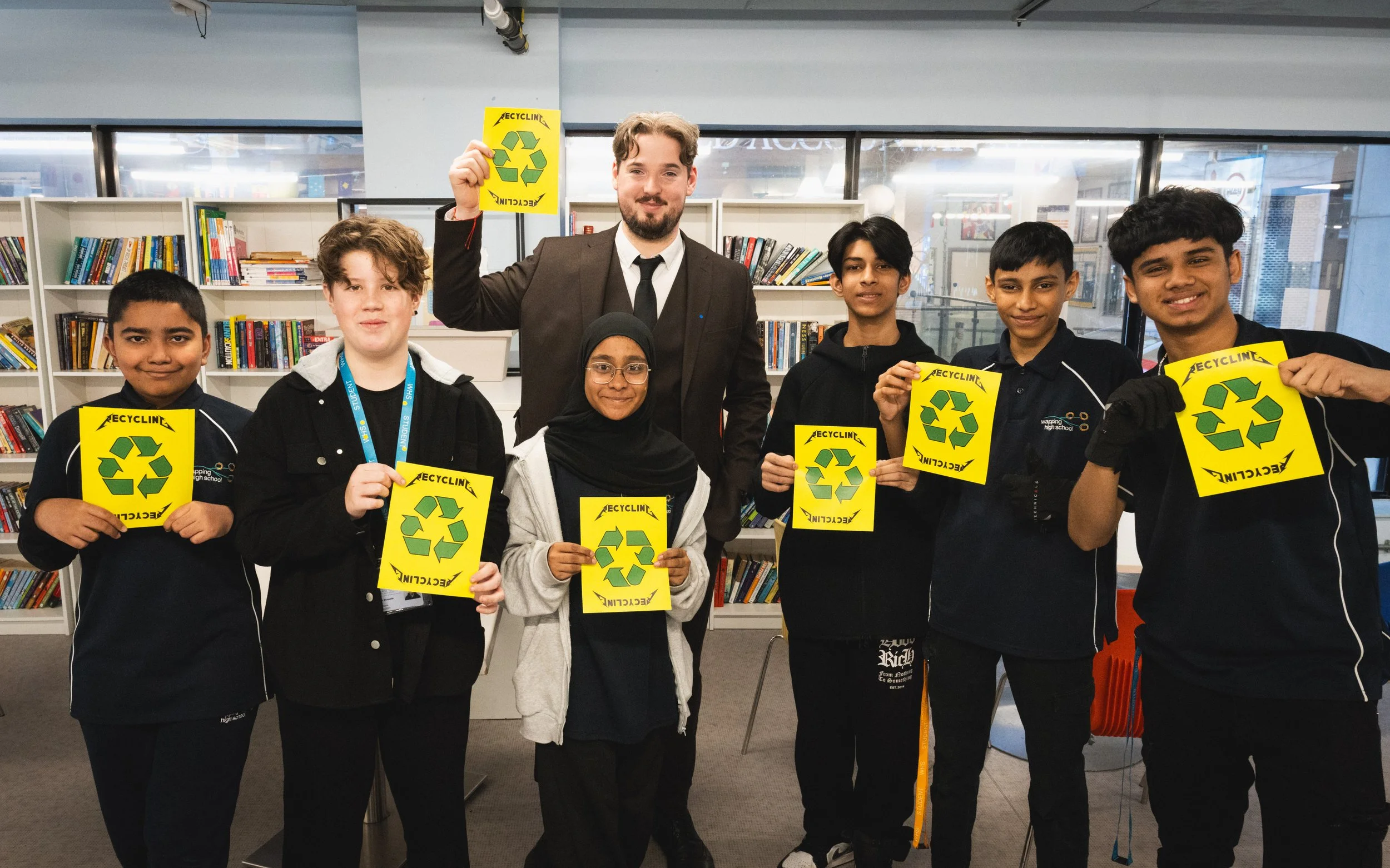A class hold up flyers they have made