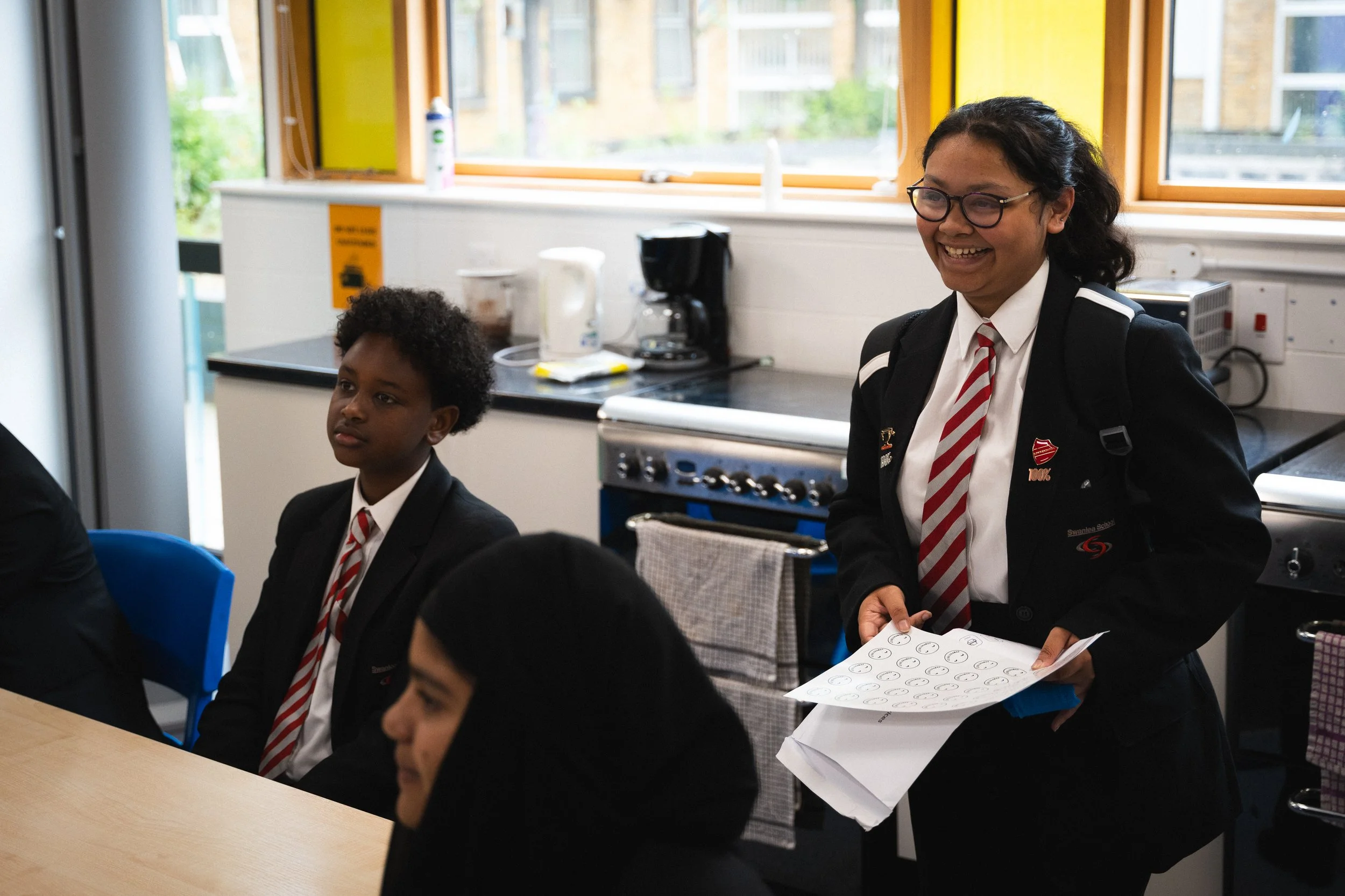 A group of young people smiling