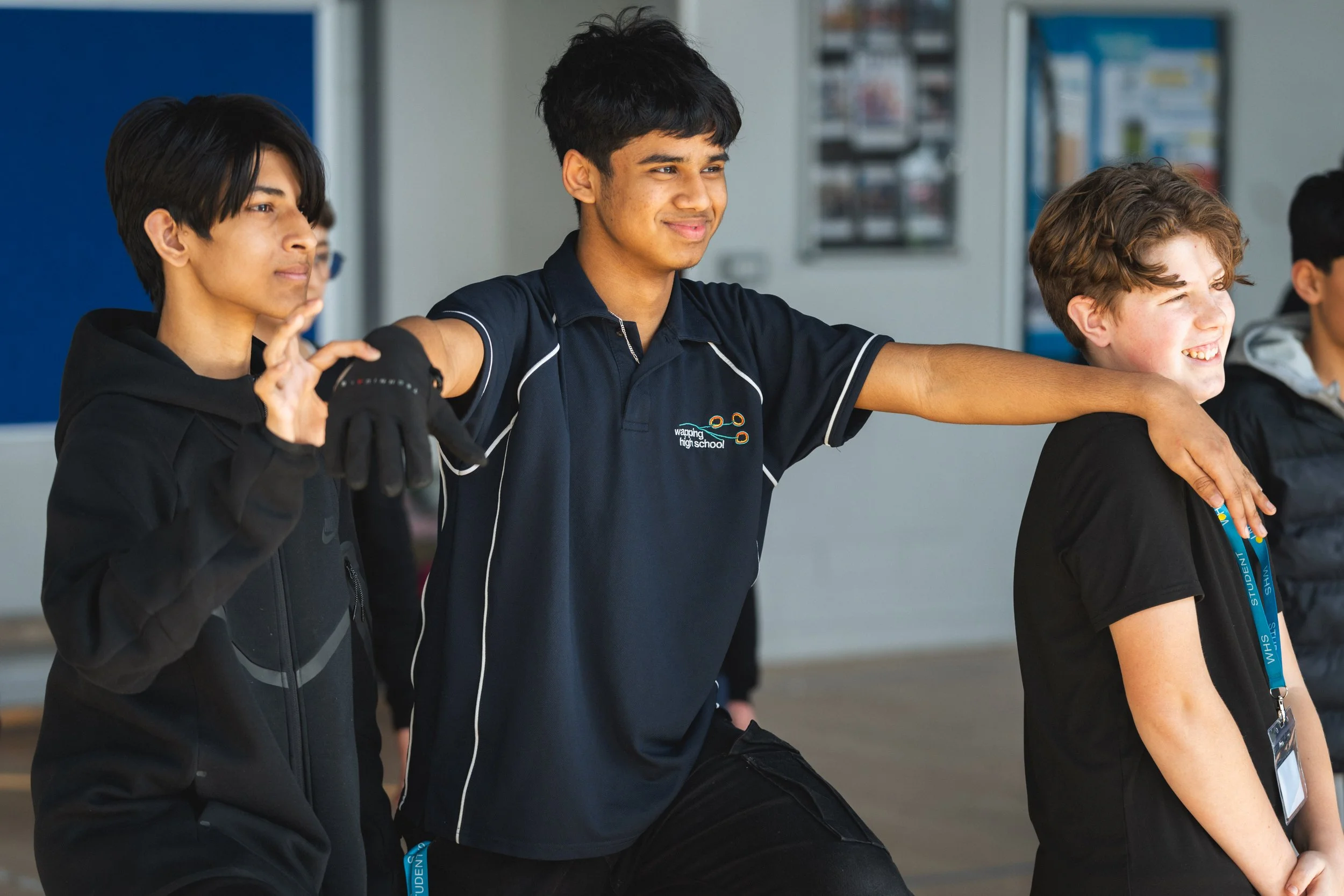 Three boys playing a game