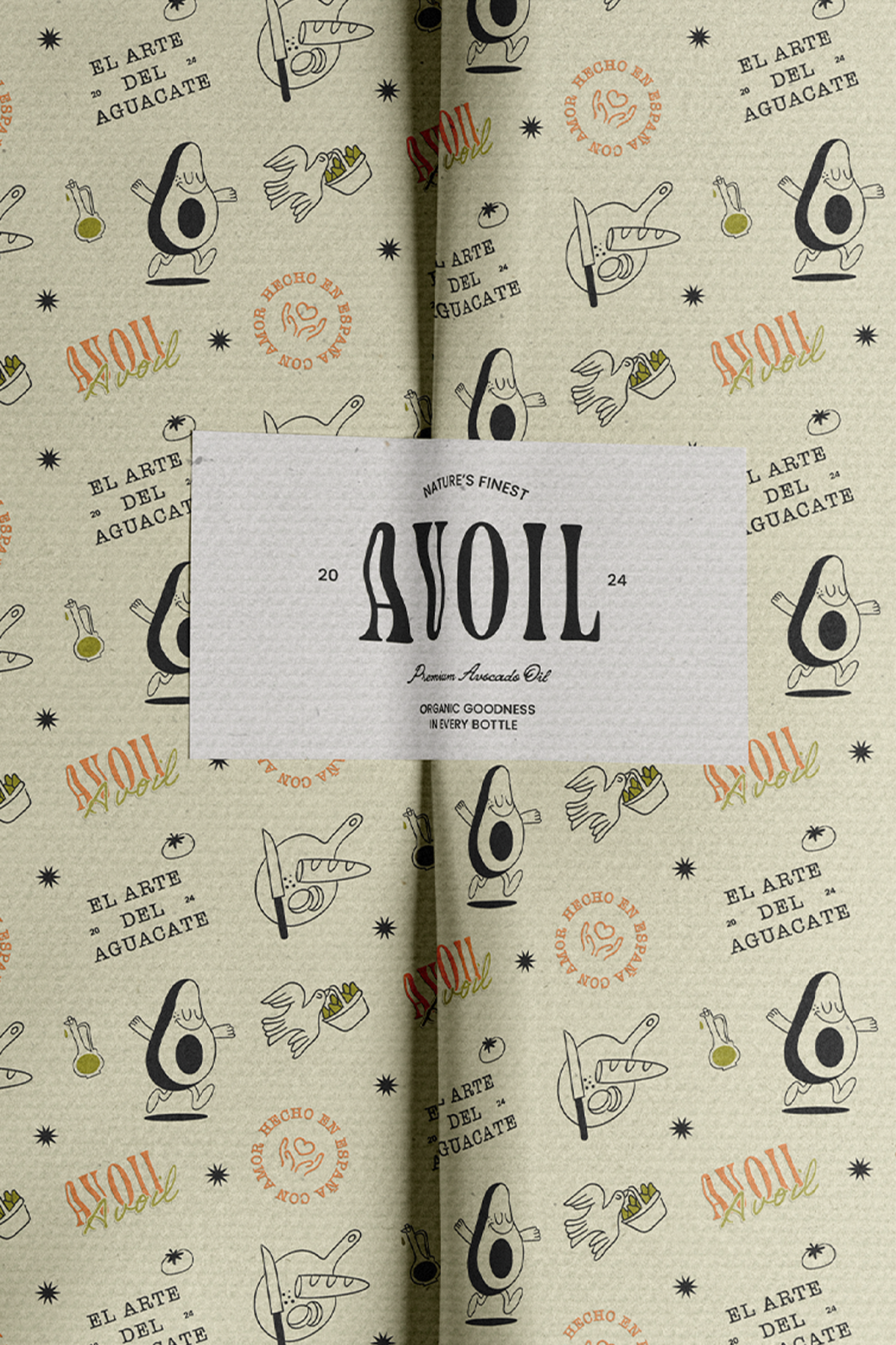 Patterned wrapping paper featuring illustrations of dancing avocados, a dove with a basket of avocados, and other avocado-themed designs. The text includes phrases like "El Arte del Aguacate" and "Avoil - Nature's Finest, Premium Avocado Oil."