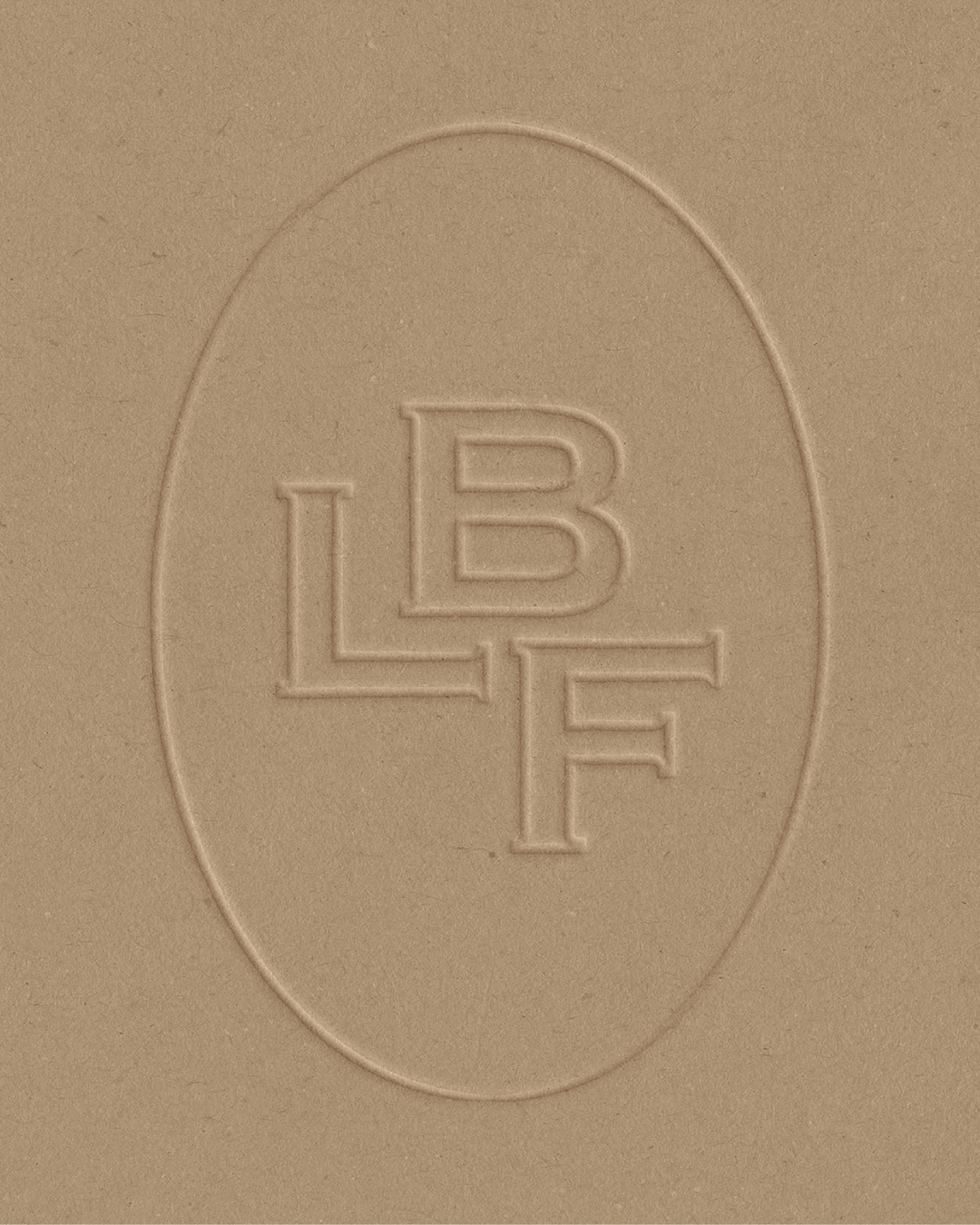 Embossed letters "LBF" in an oval on a brown cardboard texture.