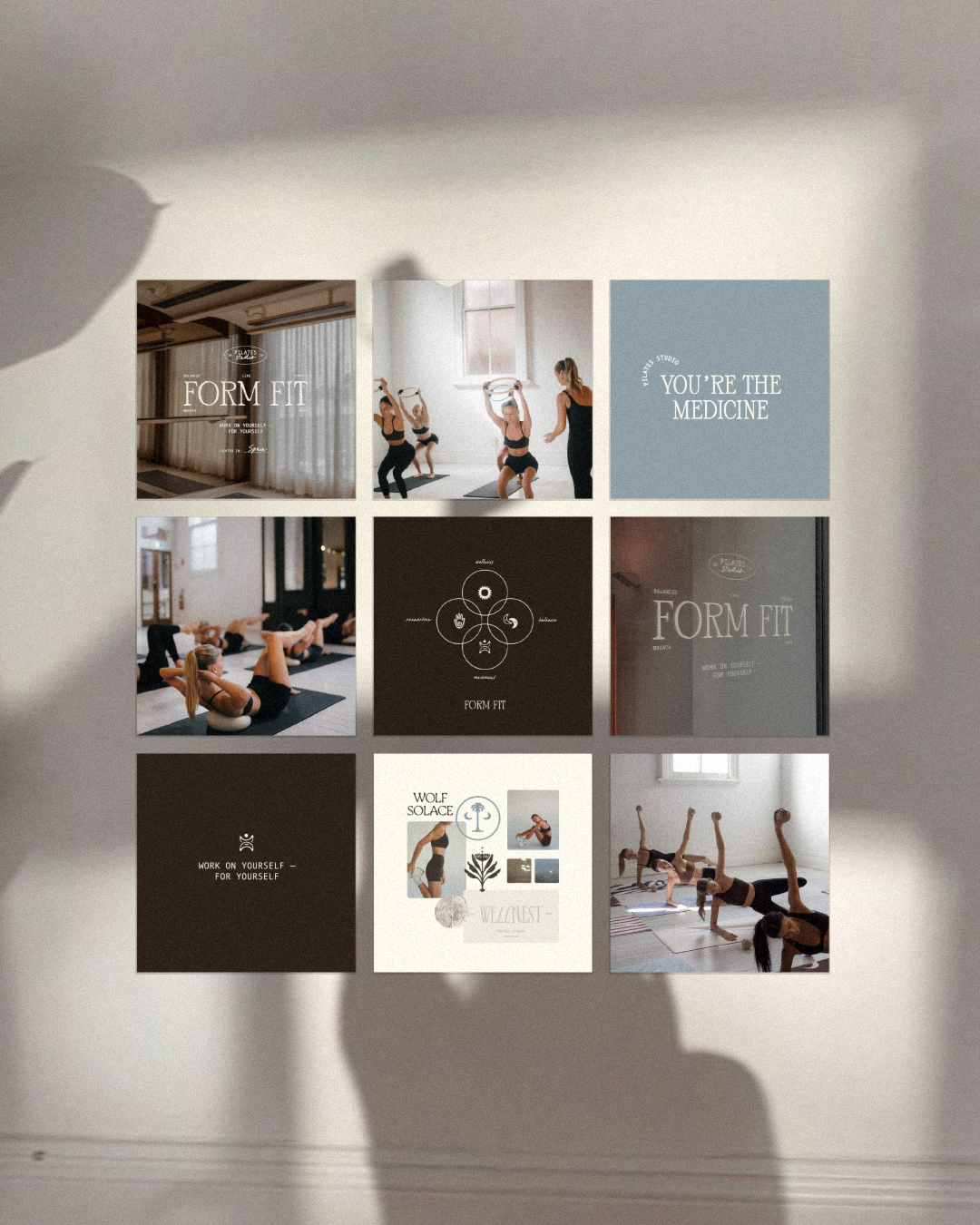Collage of yoga class images and motivational phrases on a wall. Includes photos of people practicing yoga and text like 'Form Fit' and 'You're the medicine.'