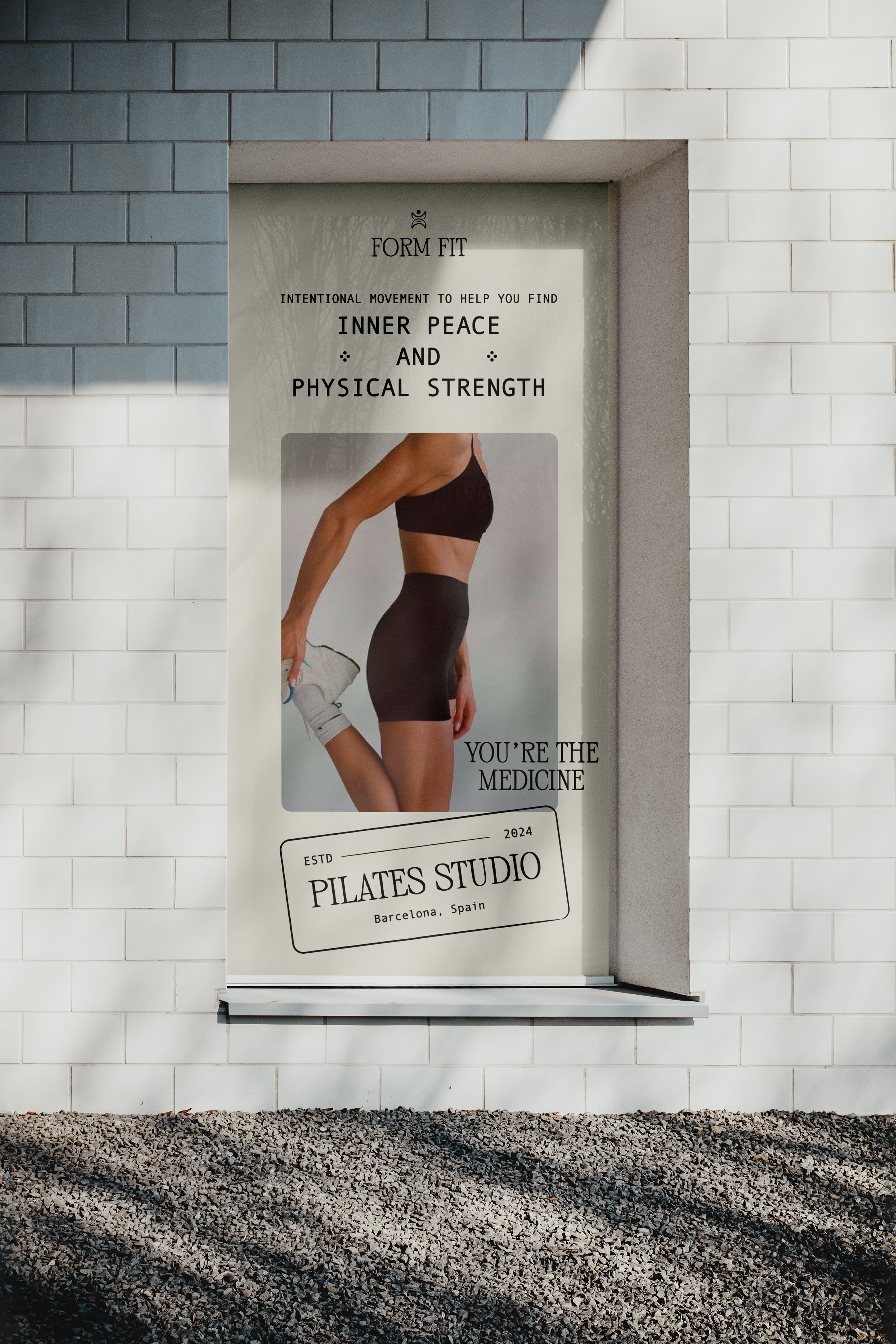 Pilates studio advertisement with woman in sportswear stretching, promoting inner peace and physical strength, located in Barcelona, Spain.