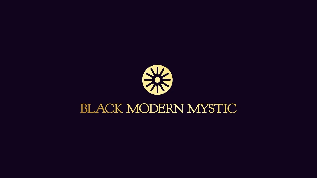 Black background with a gold circular emblem and the text 'Black Modern Mystic' in gold below the emblem.