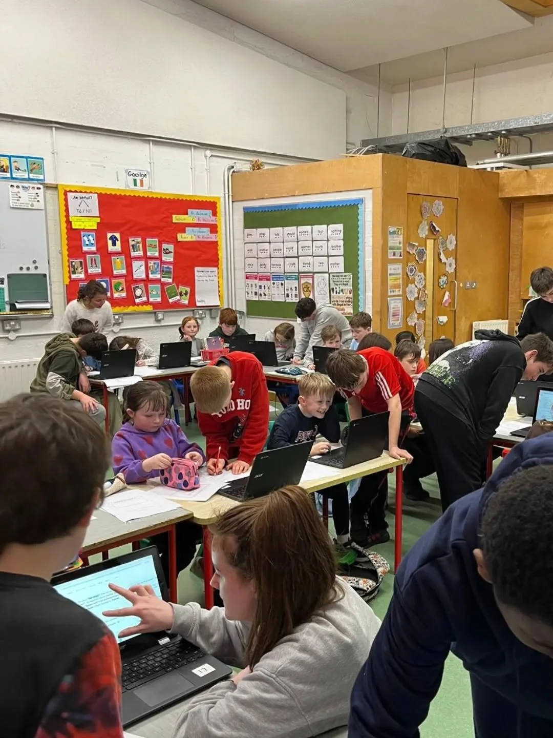 6th Class 2 and 2nd Class 2 working together researching cultures around the world 🗺️