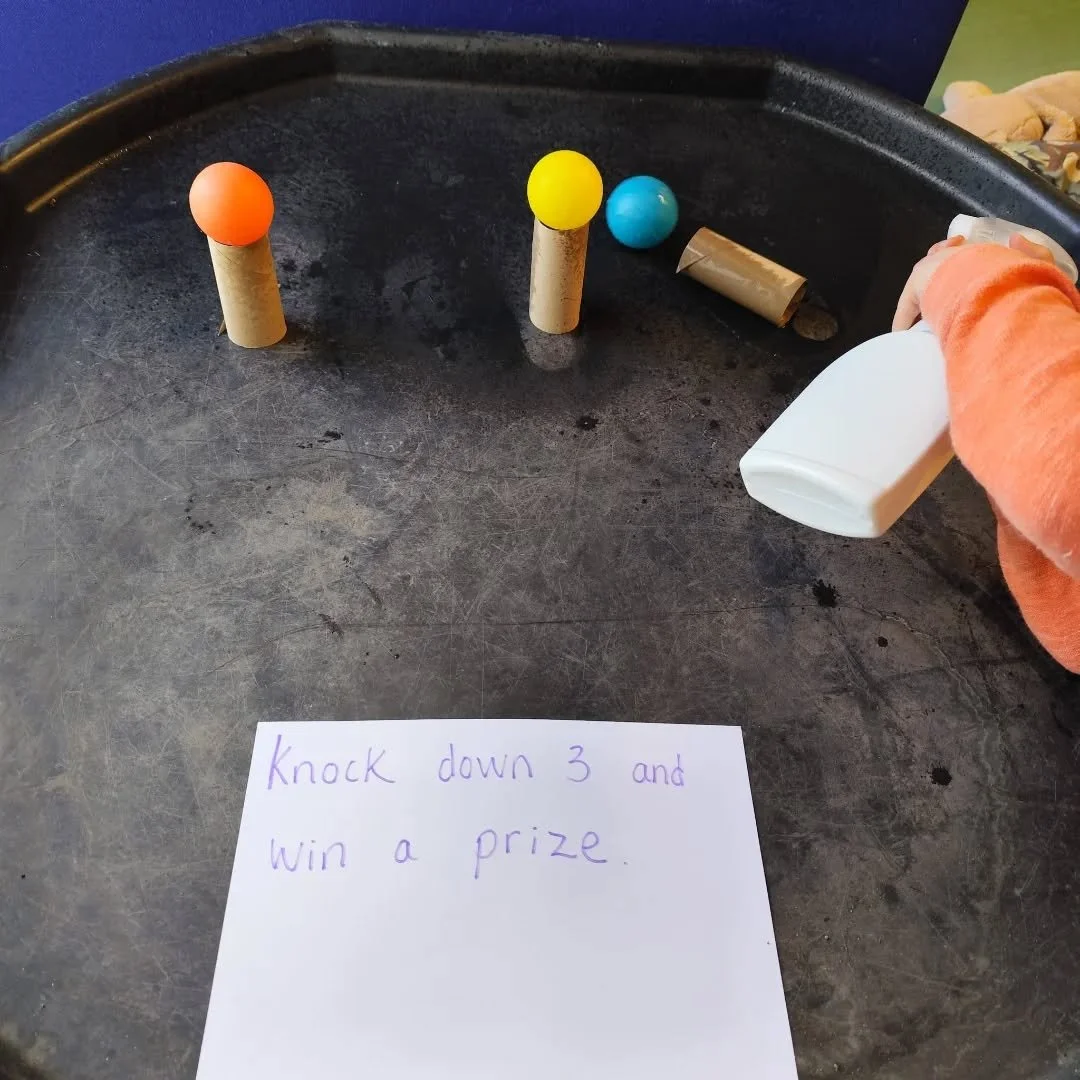 Fine motor game in Peter's class this morning. 
Knock down 3 balls and win a prize!